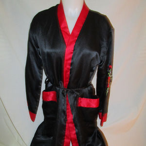 Black robe with red embroidered flowers, small